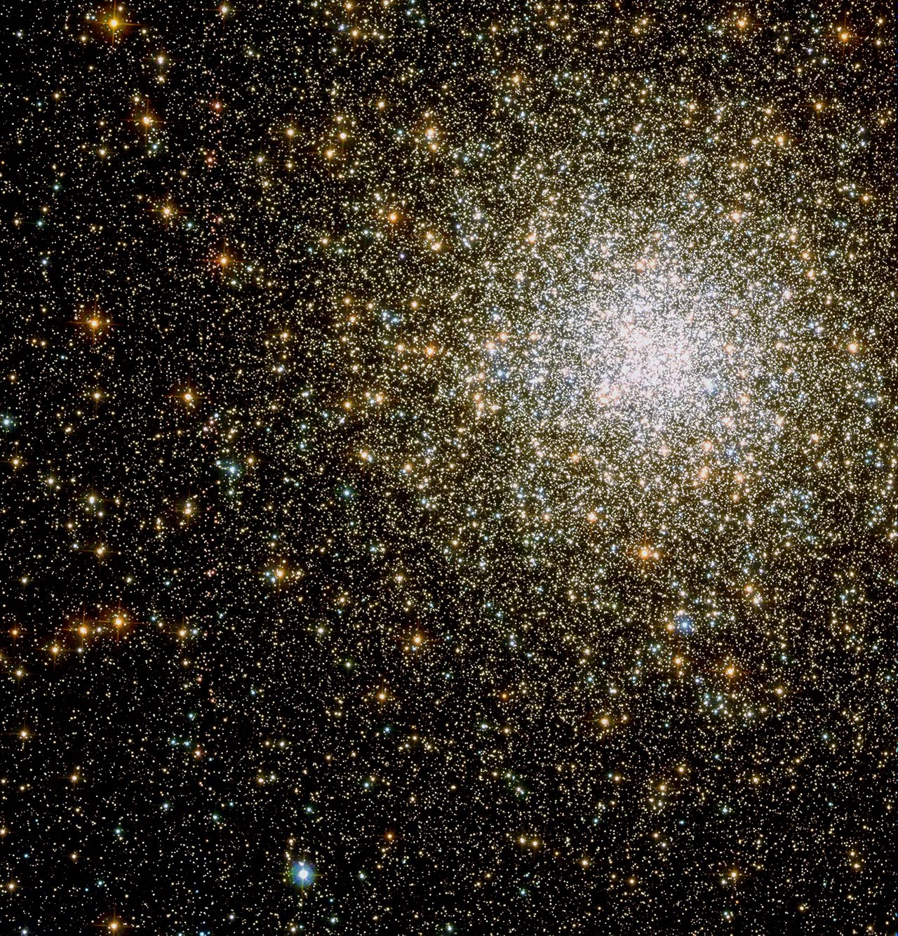 A sparkling cluster of yellow and white stars, primarily concentrated near the upper right.