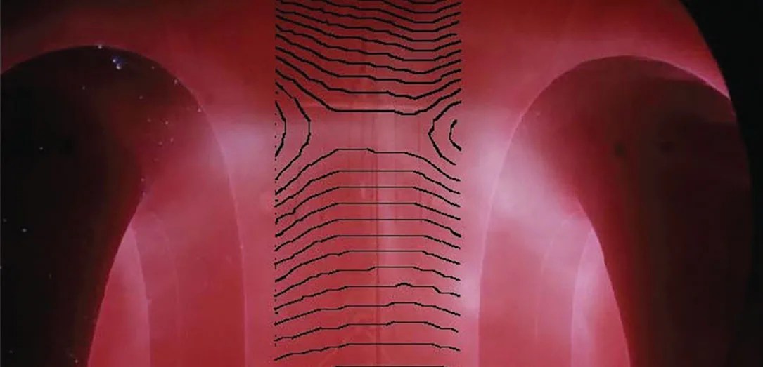 Photo of the magnetic fields of coils represented by shades of pink for the magnetic fields and black lines for the coils.