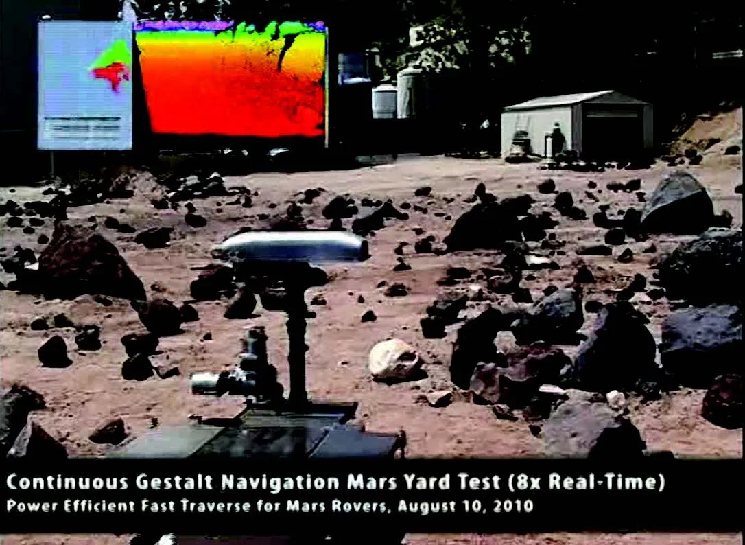 Video still frame of new rover navigating rocky terrain