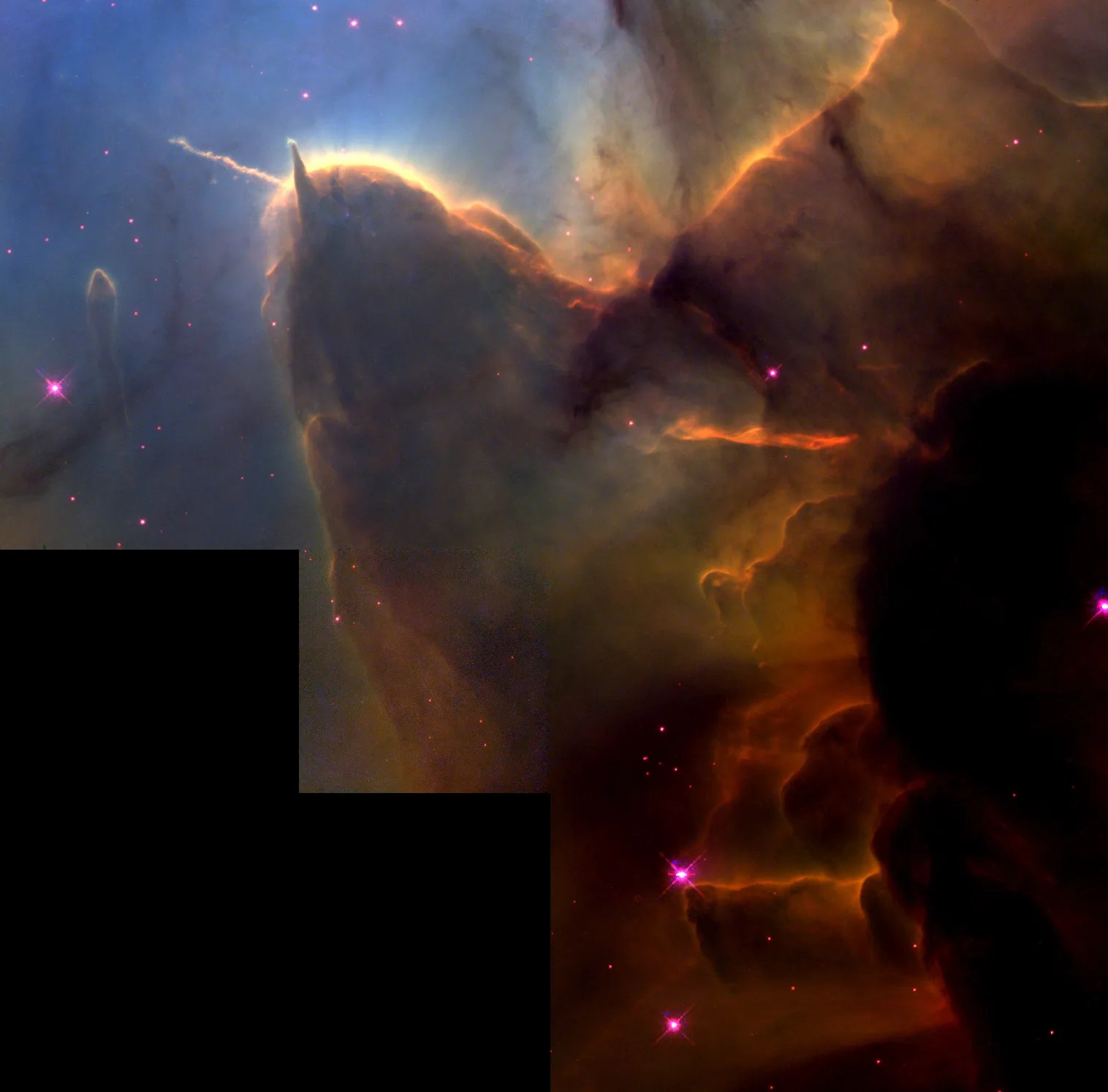 star-forming cloud of gas and dust with a rounded hump that includes two skinny towers of gas and dust that resemble the head of an insect with its antennas.