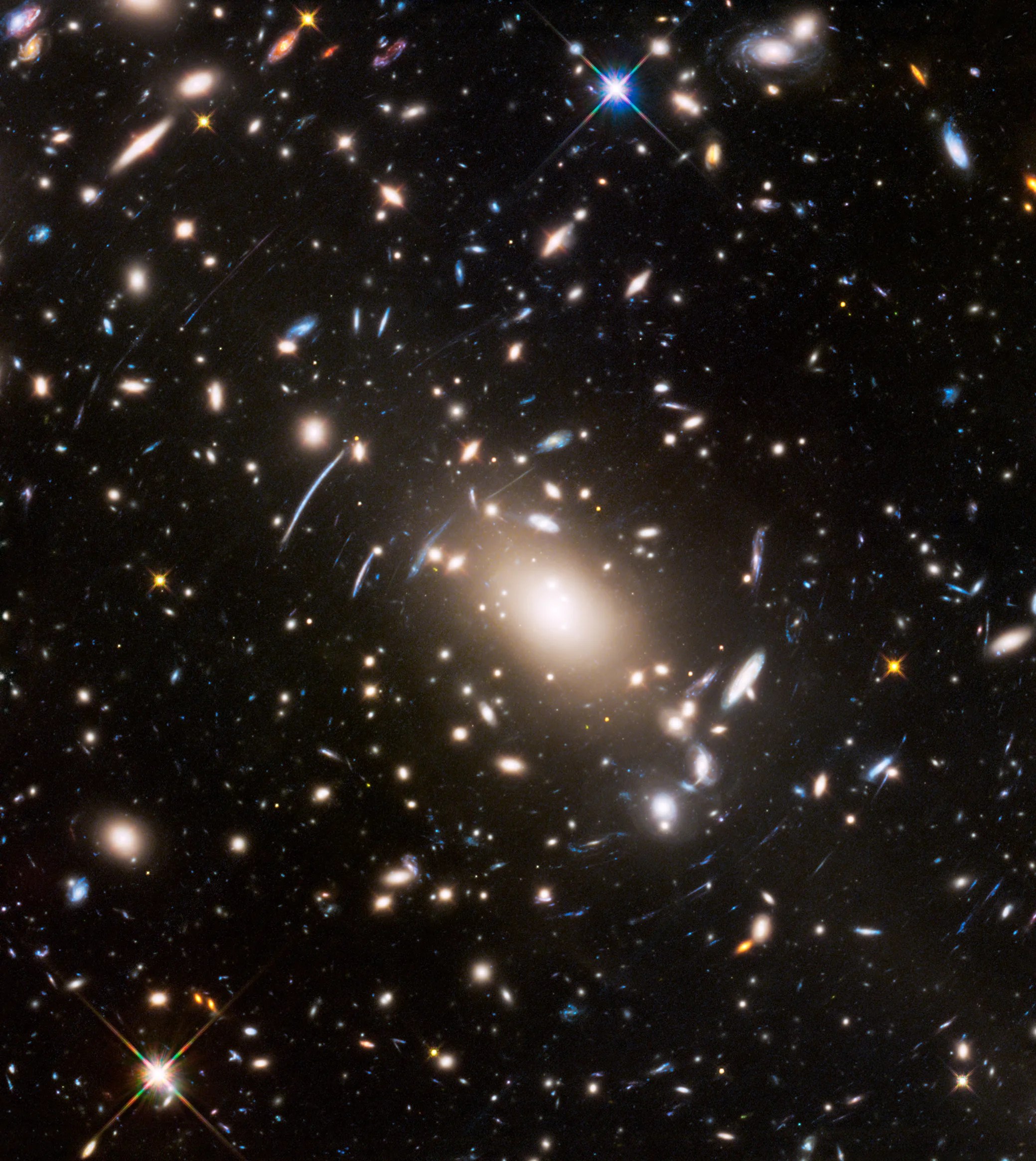 Massive cluster of galaxies with a gravitational lensing distortion effect.