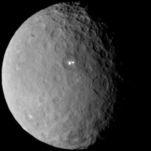 Dawn’s view of Ceres and its brightest spots on Feb. 19, 2015, from a distance of about 46,000 kilometers.  Credit: NASA/JPL-Caltech/UCLA/MPS/DLR/IDA