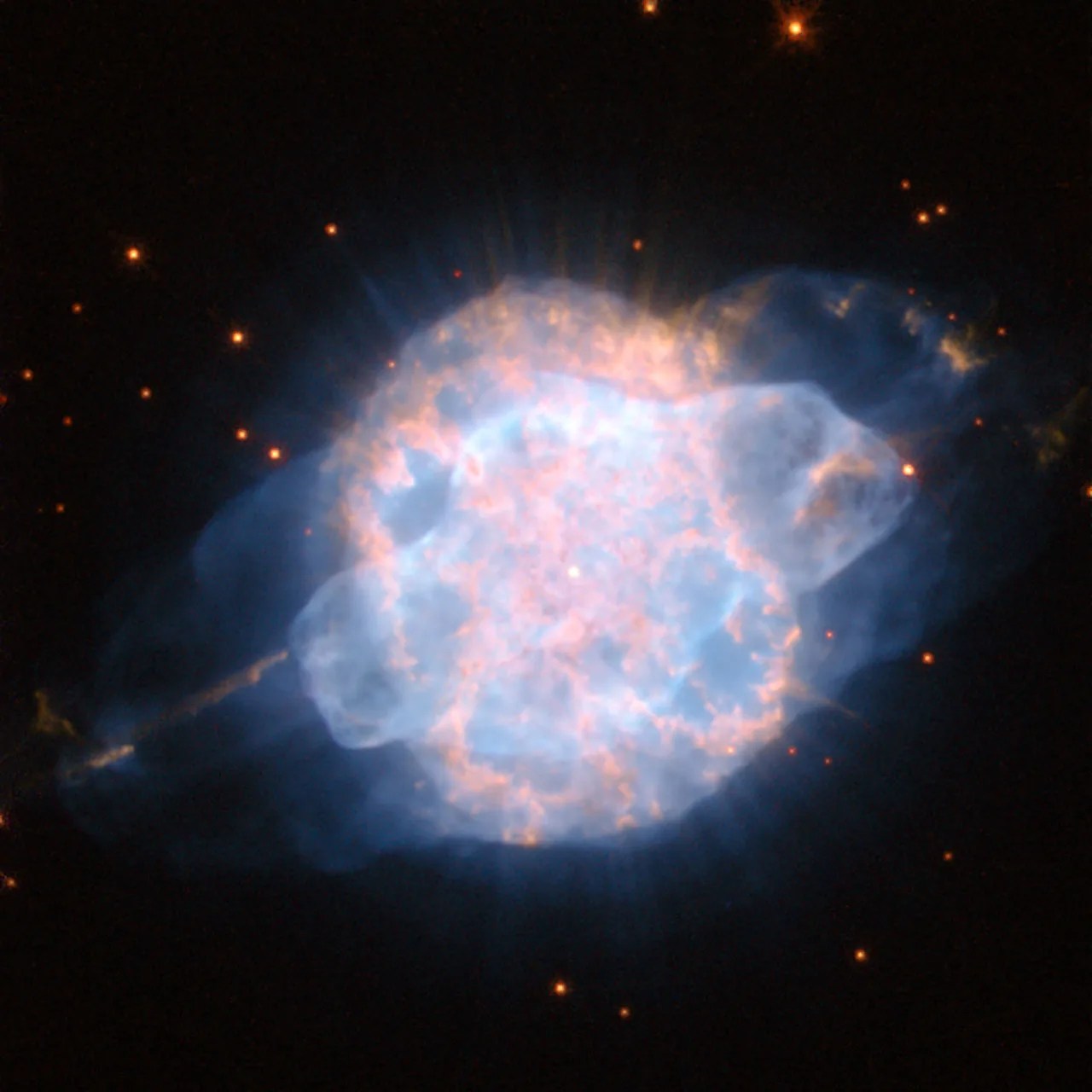 Large blue and pink blob surrounds a bright star