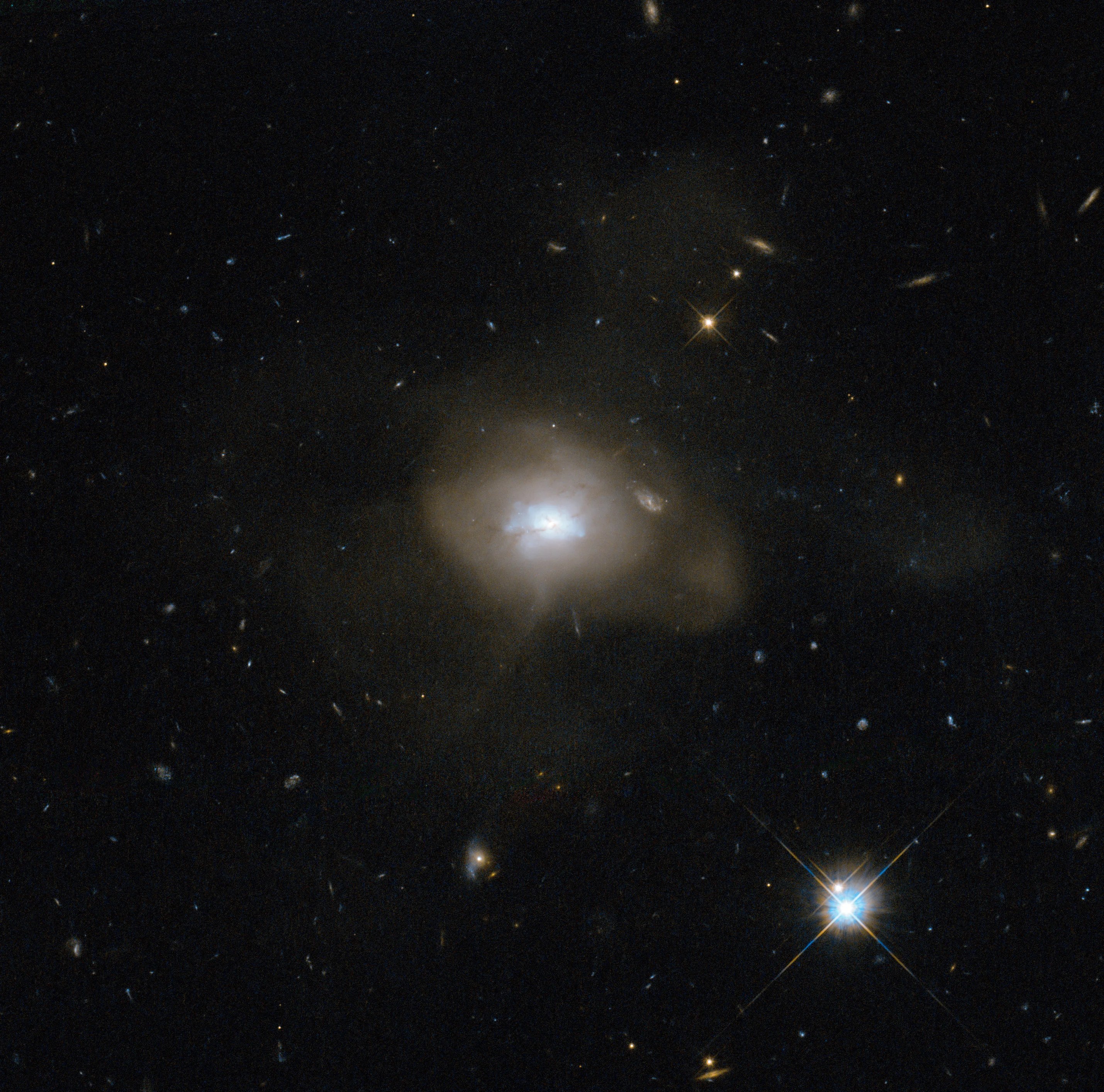 Milky, diffuse assymetrical galaxy