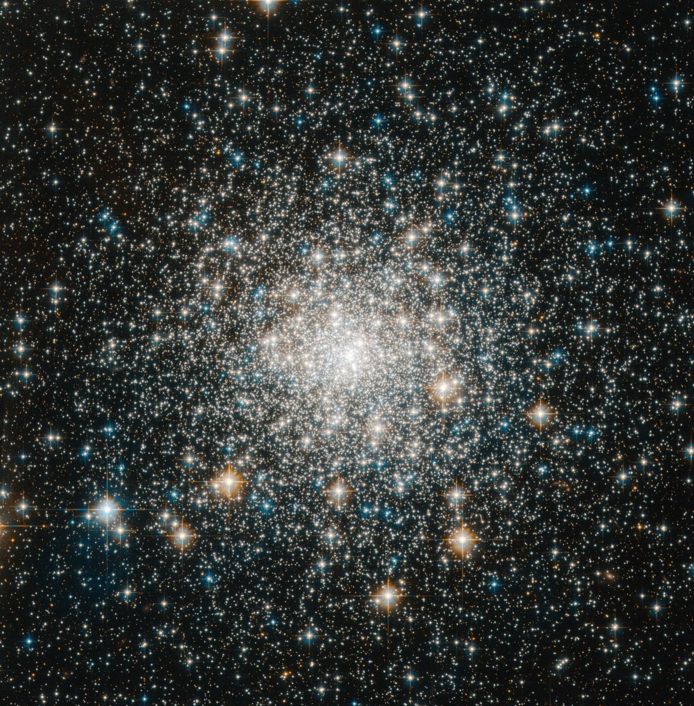 A cluster of bright stars, concentrated at the center.