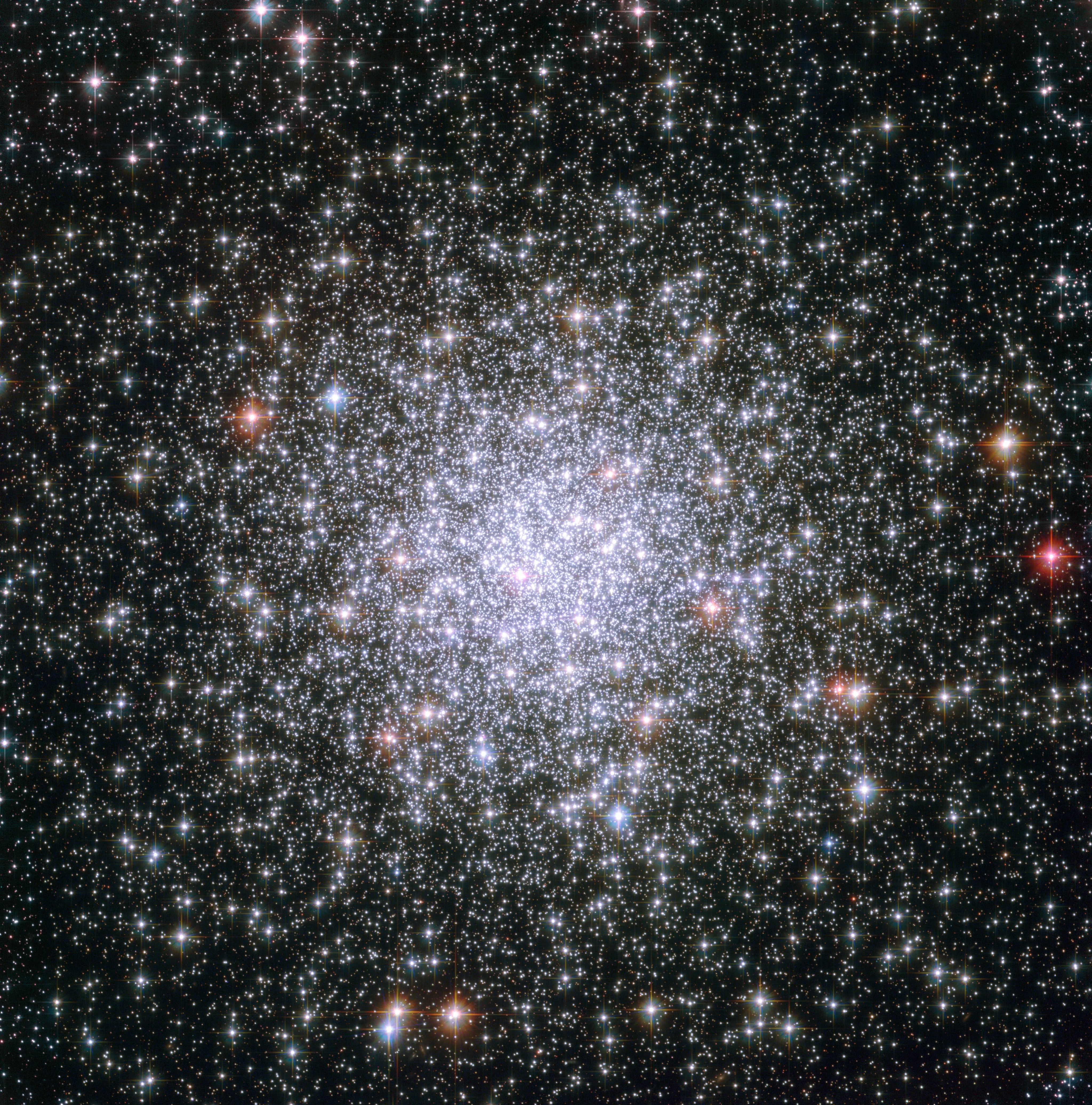 A cluster of bright stars, concentrated at the center.