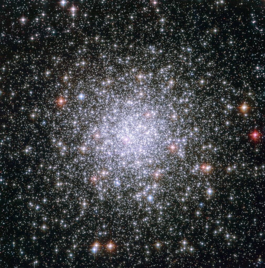 A cluster of bright stars, concentrated at the center.