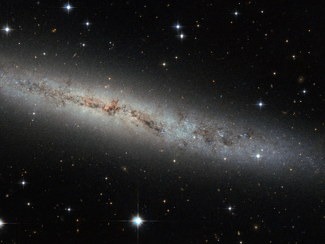 Hubble Eyes Galaxy as Flat as a Pancake - NASA Science