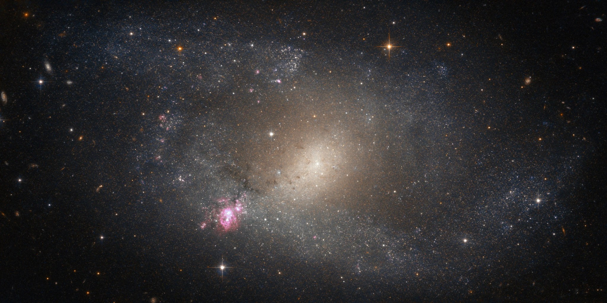 Barred spiral galaxy with extra blue starbursts