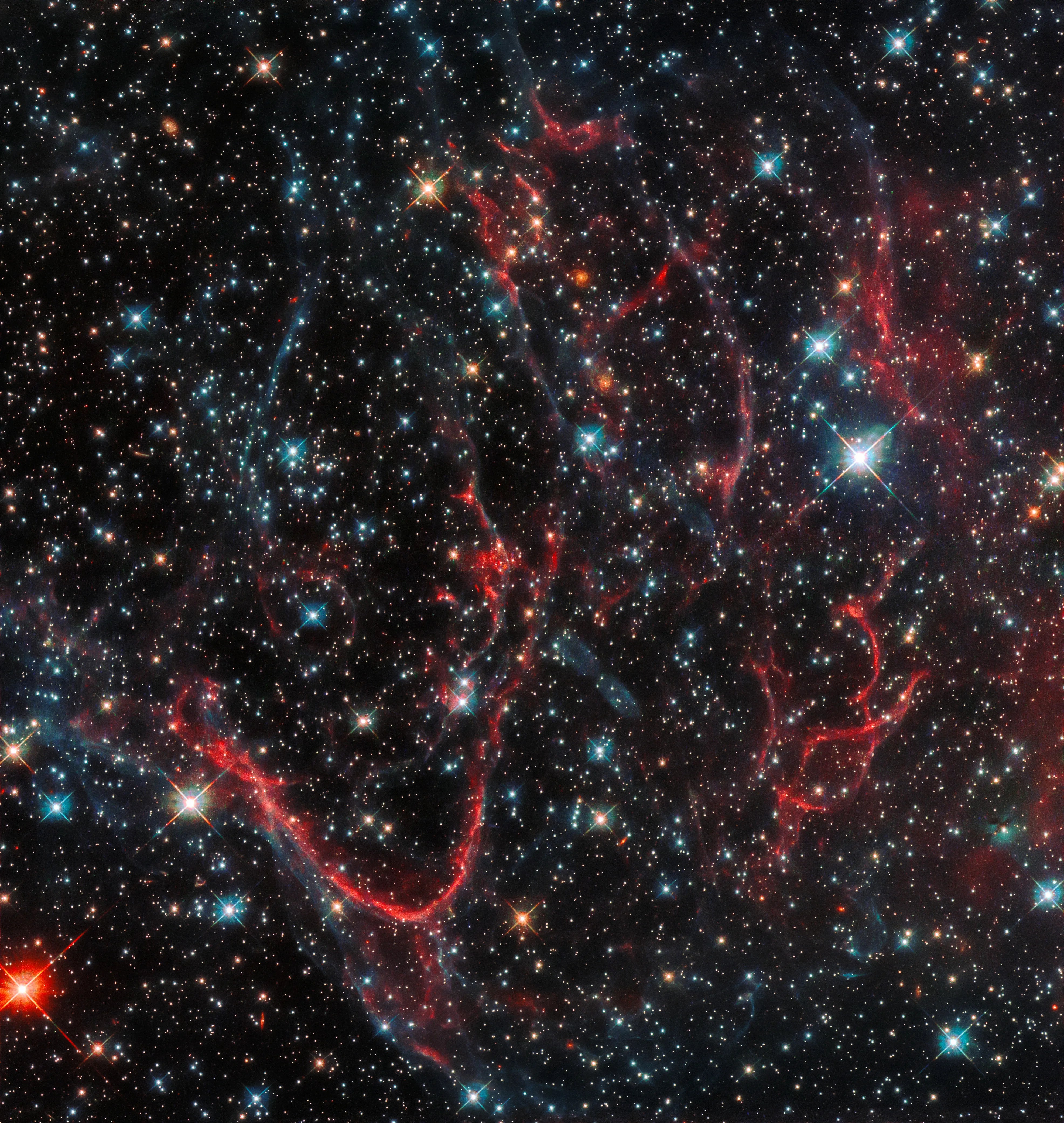 Red and blue streamers in space
