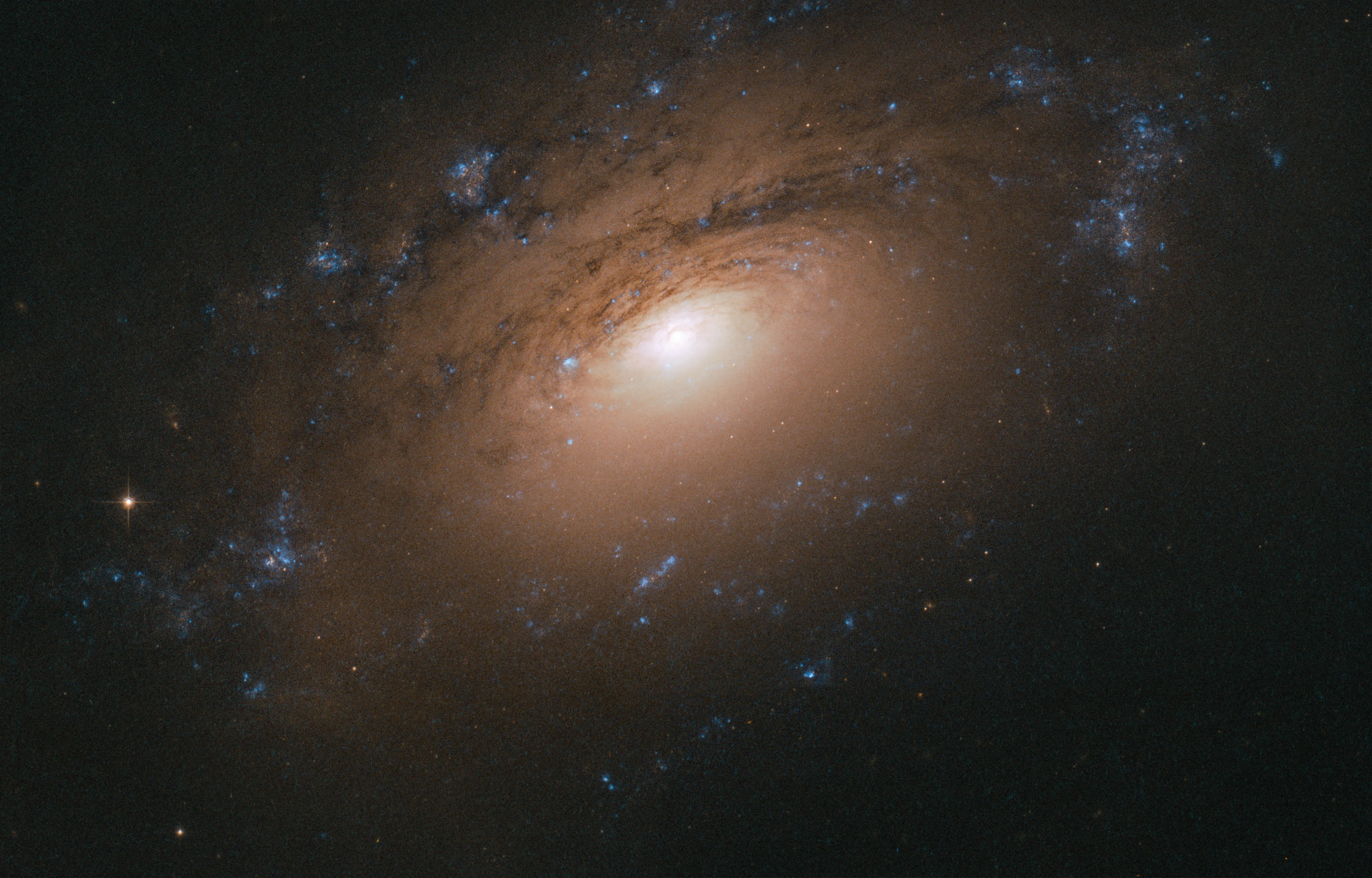 Ngc 3169 spiral galaxy, as seen by hubble