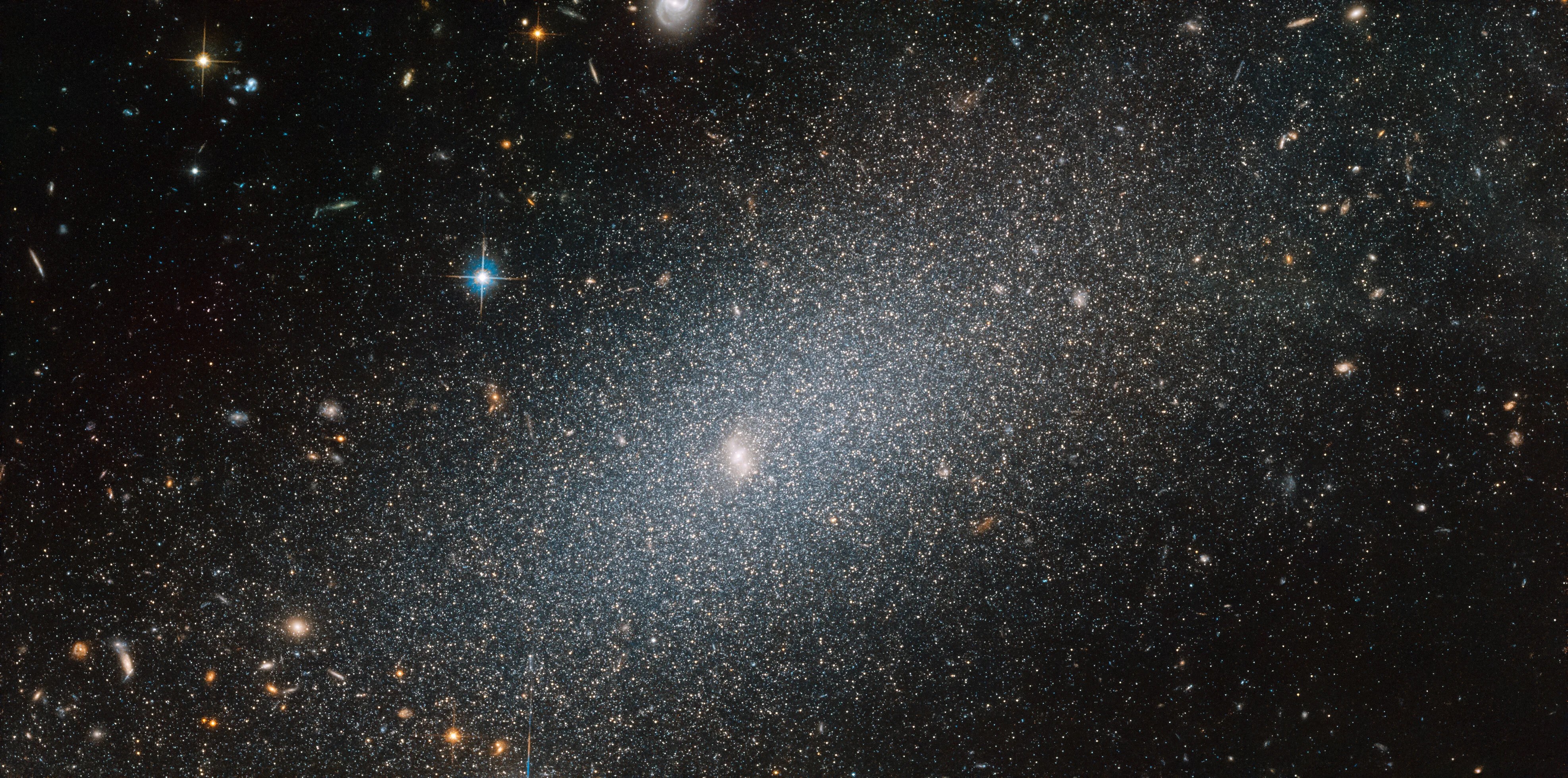 Sparkling-white galaxy pgc 29388 against black backdrop of space