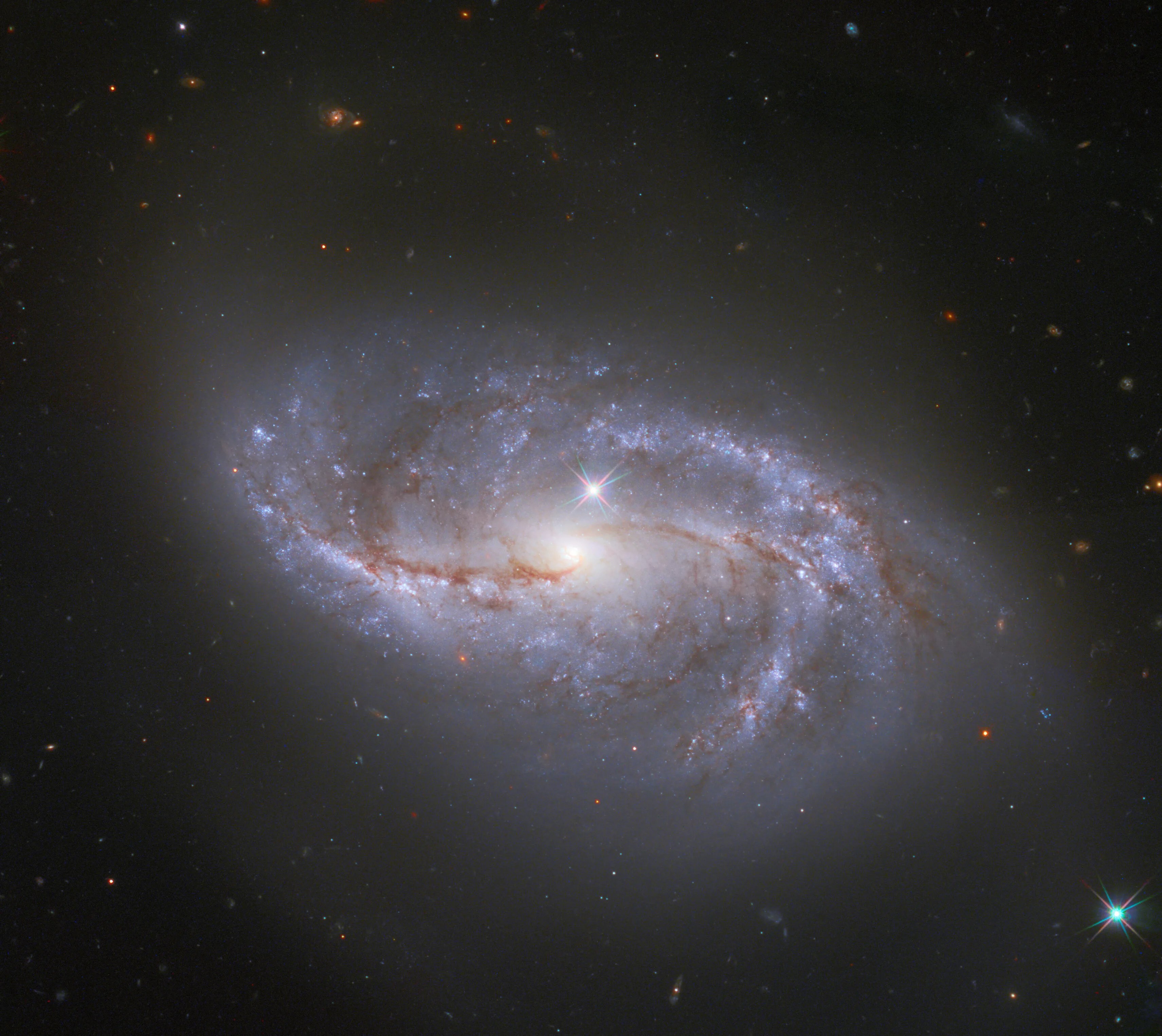 Bright spiral galaxy ngc 2608 against the black backdrop of space