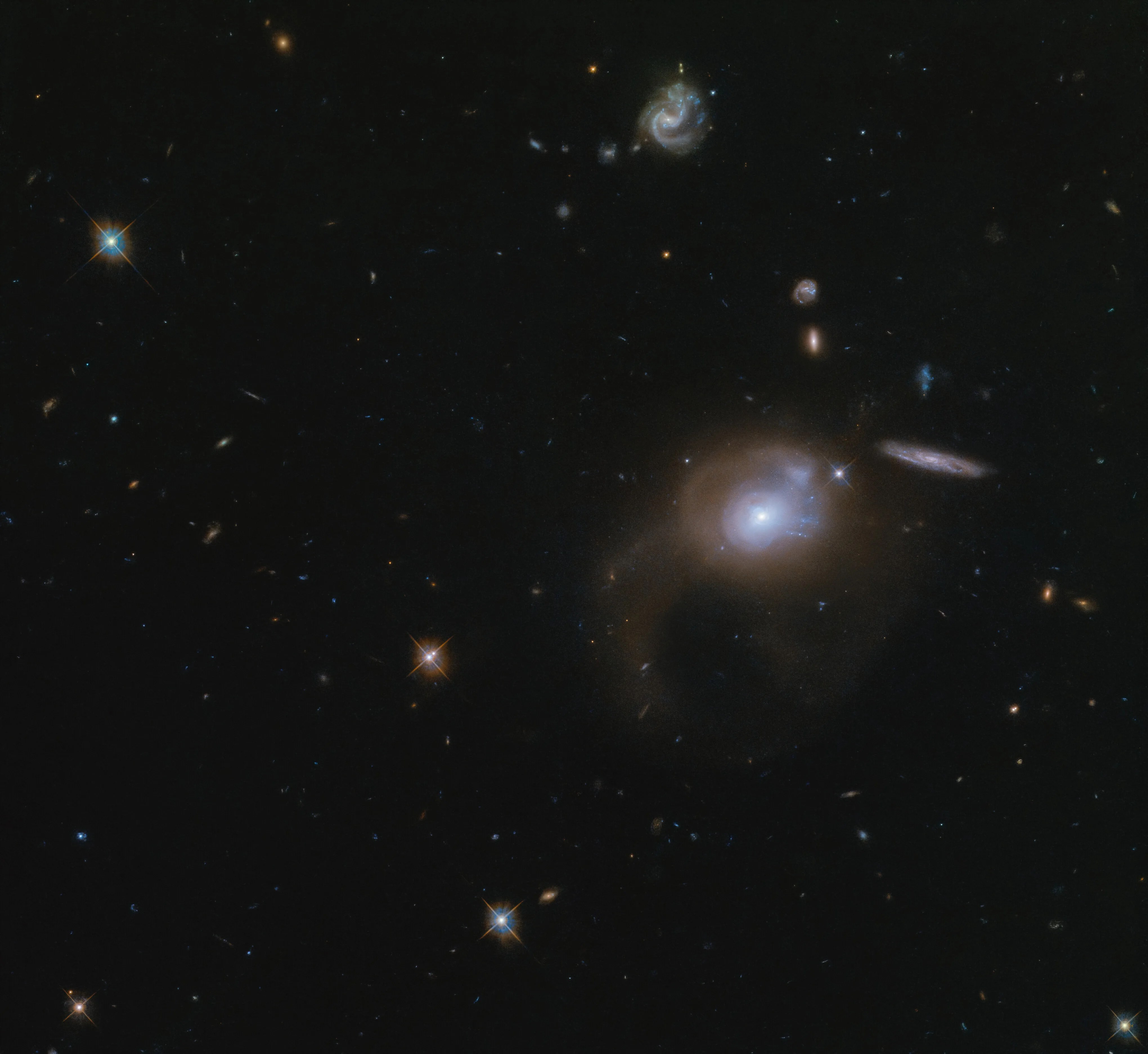 This large expanse of space captured with the hubble space telescope features the galaxy sdssj225506.80+005839.9.