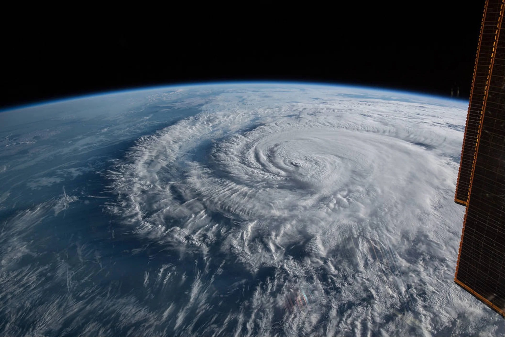 Satellite photo of large hurricane making landfall.