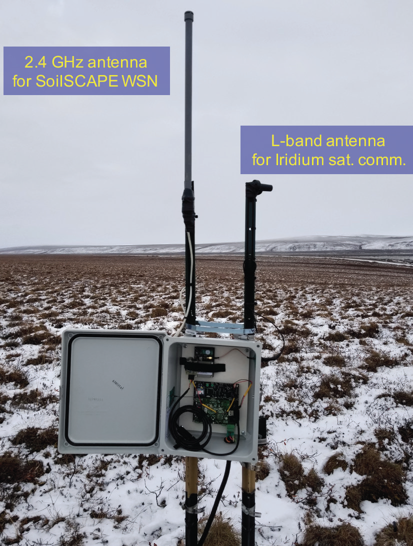 Photo of SoilSCAPE base station in a field in Alaska