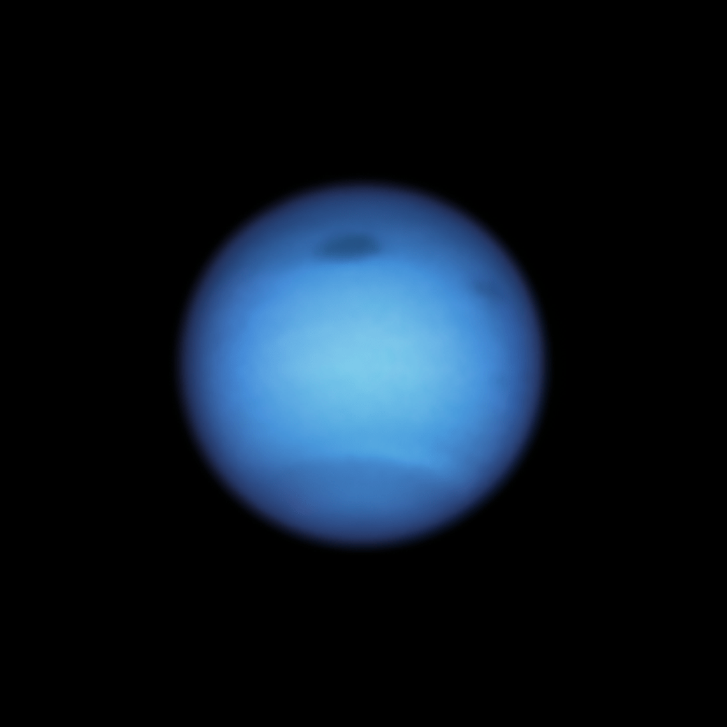 This Hubble Space Telescope snapshot of the dynamic blue-green planet Neptune
