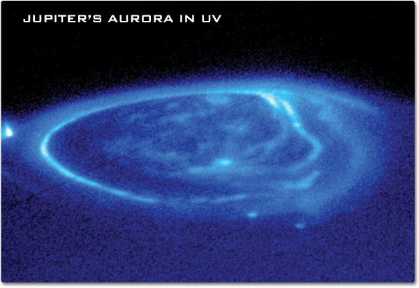 A close-up of Jupiter's pole showing an aurora as a wispy ring of light blue color.