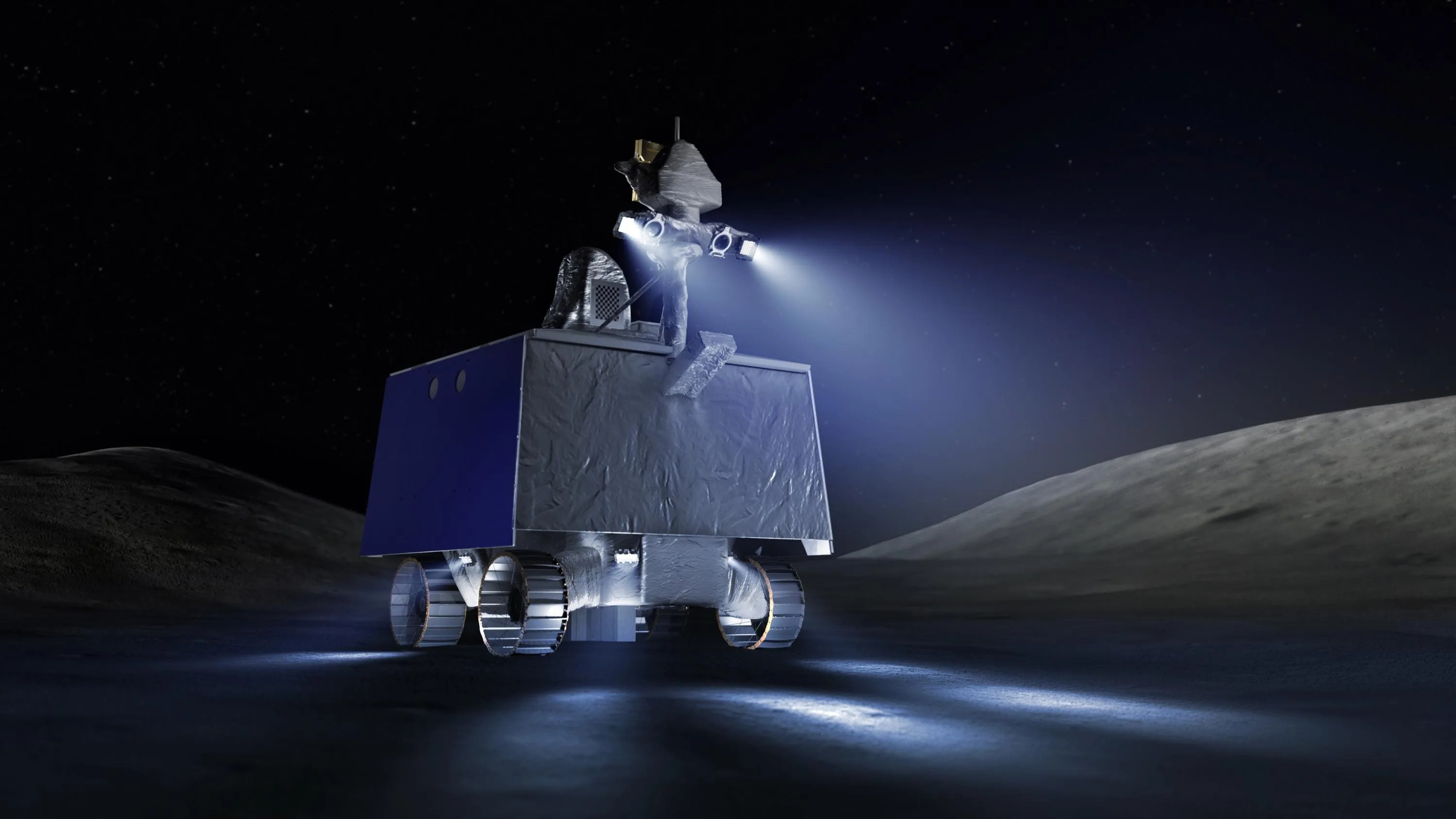 A graphic illustration of the rover known as VIPER. It is mostly grey with blue siding and the central structure is box-like. Four wheels are underneath the rover, which will help it traverse the lunar south pole. Mounted on top of the rover are a couple of additional small structures as well as lights that will shine the way in permanently shadowed regions (PSRS). In the background is a simulation of the Moon’s surface surrounded by black space.