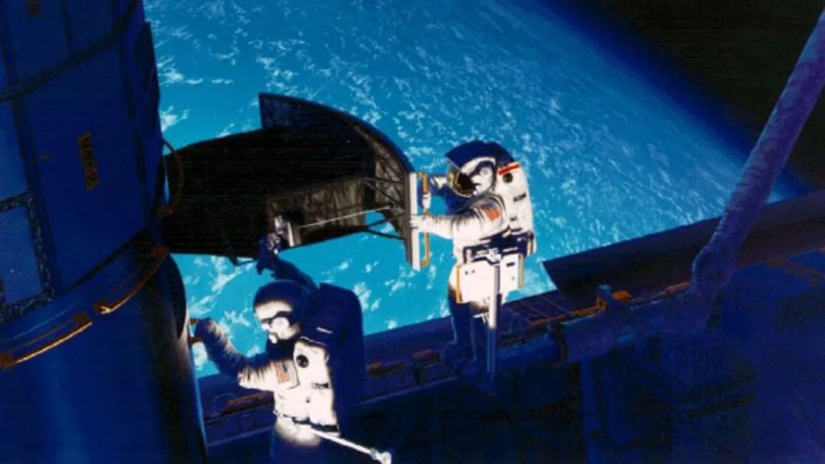 Camera installation by shuttle astronauts
