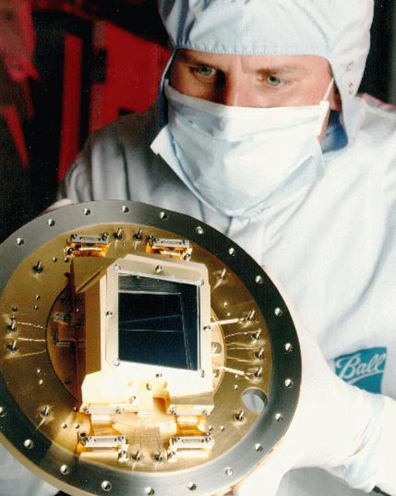 This is an image of a technician holding the ACS WFP CCD.