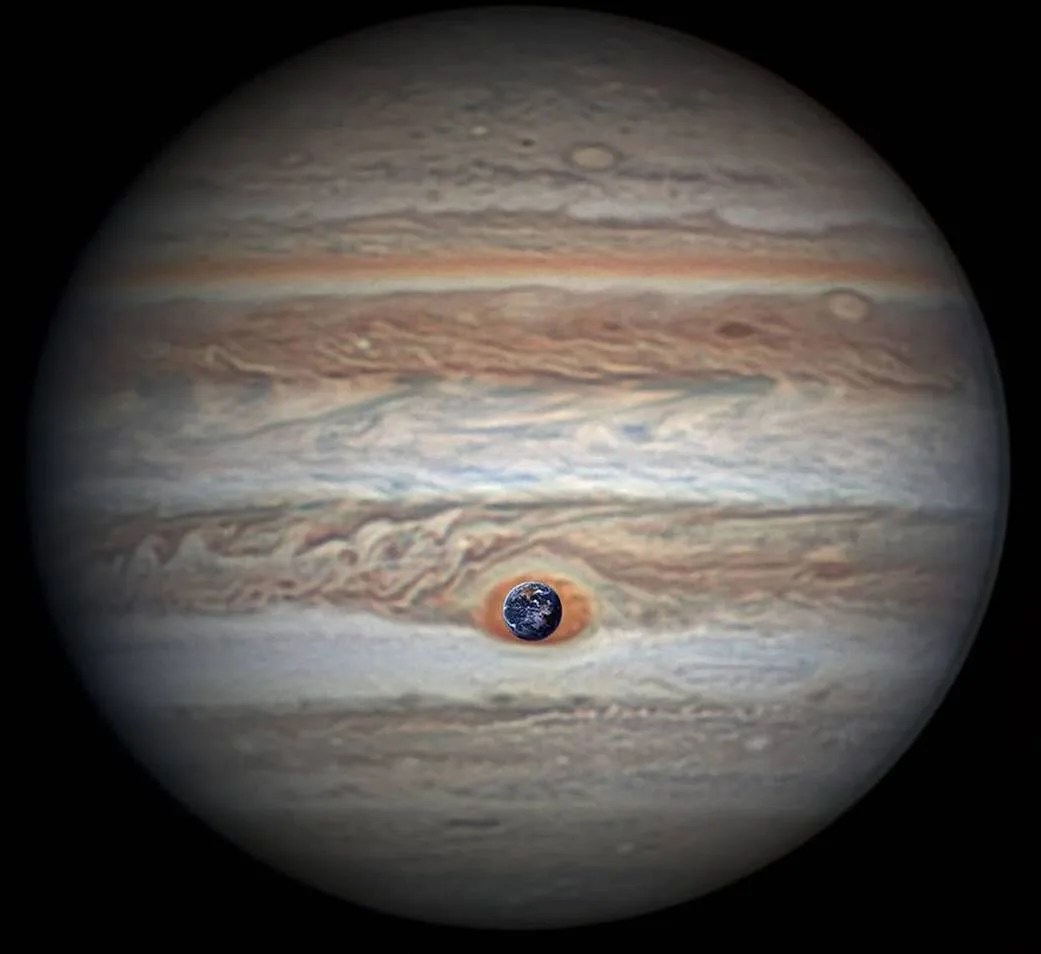 Solar System - Jupiter. It is the fifth planet from the Sun and the largest  in the Solar System. Its a giant planet with a mass one-thousandth that of  Stock Photo -