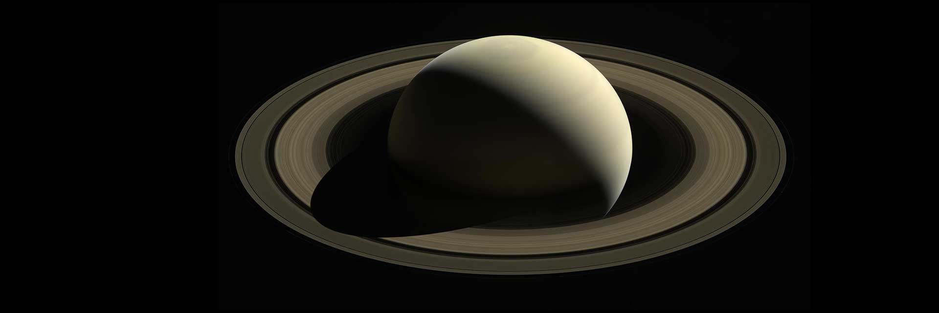 A view of Saturn from the Cassini spacecraft shows the golden planet with its rings.