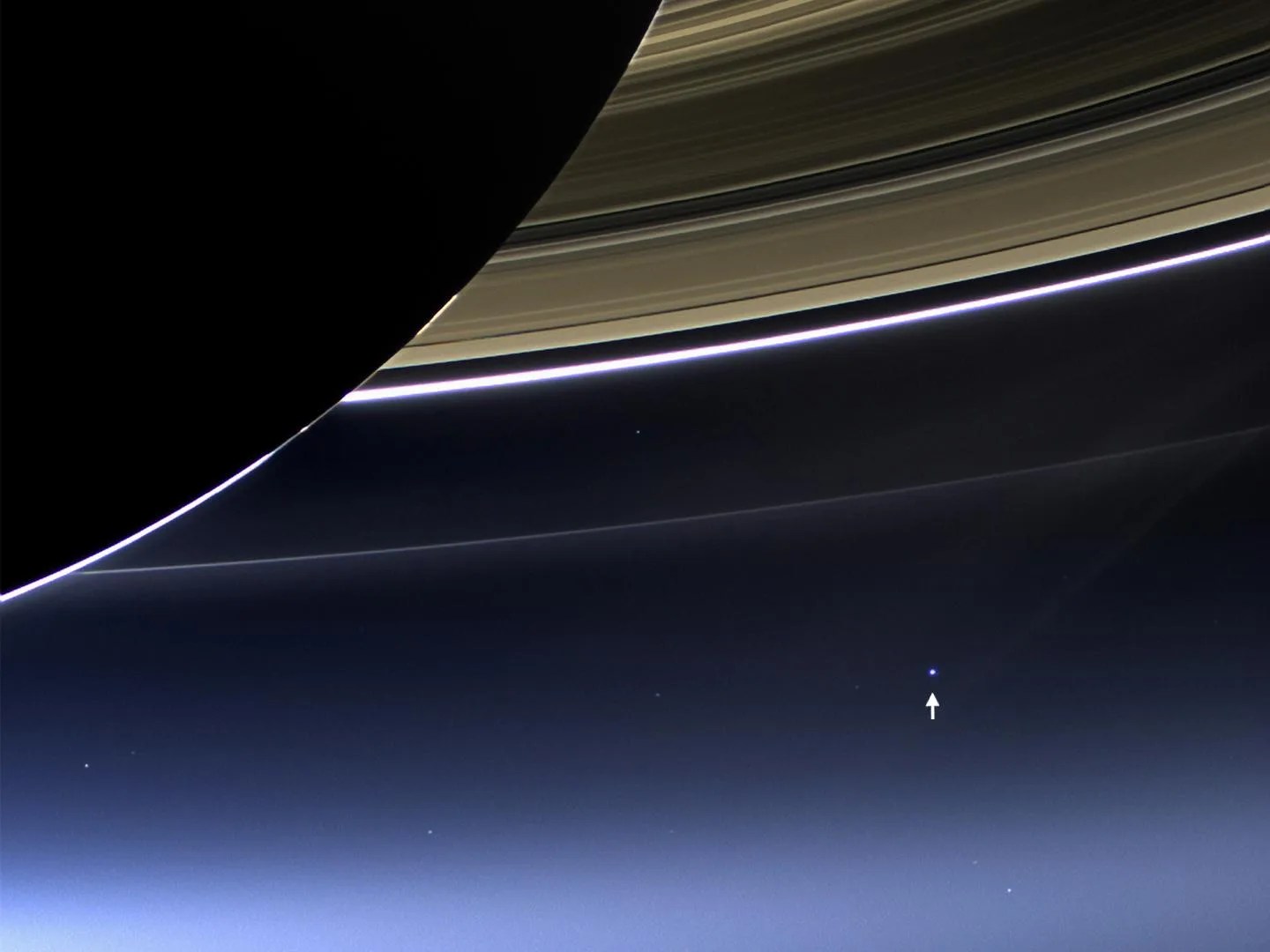 Color image of Saturn and Earth