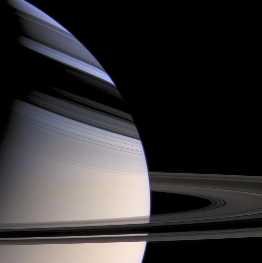 Color image of Saturn and its rings, with ring shadows on the planet.
