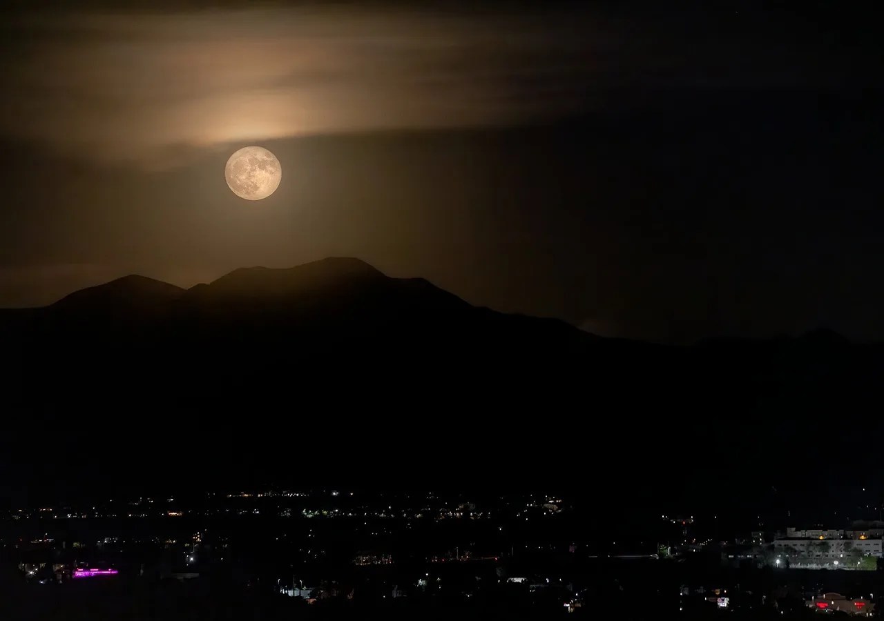 The full moon over Santa Clarita, California, on July 13, 2022. Credit: NASA/Kevin Gill