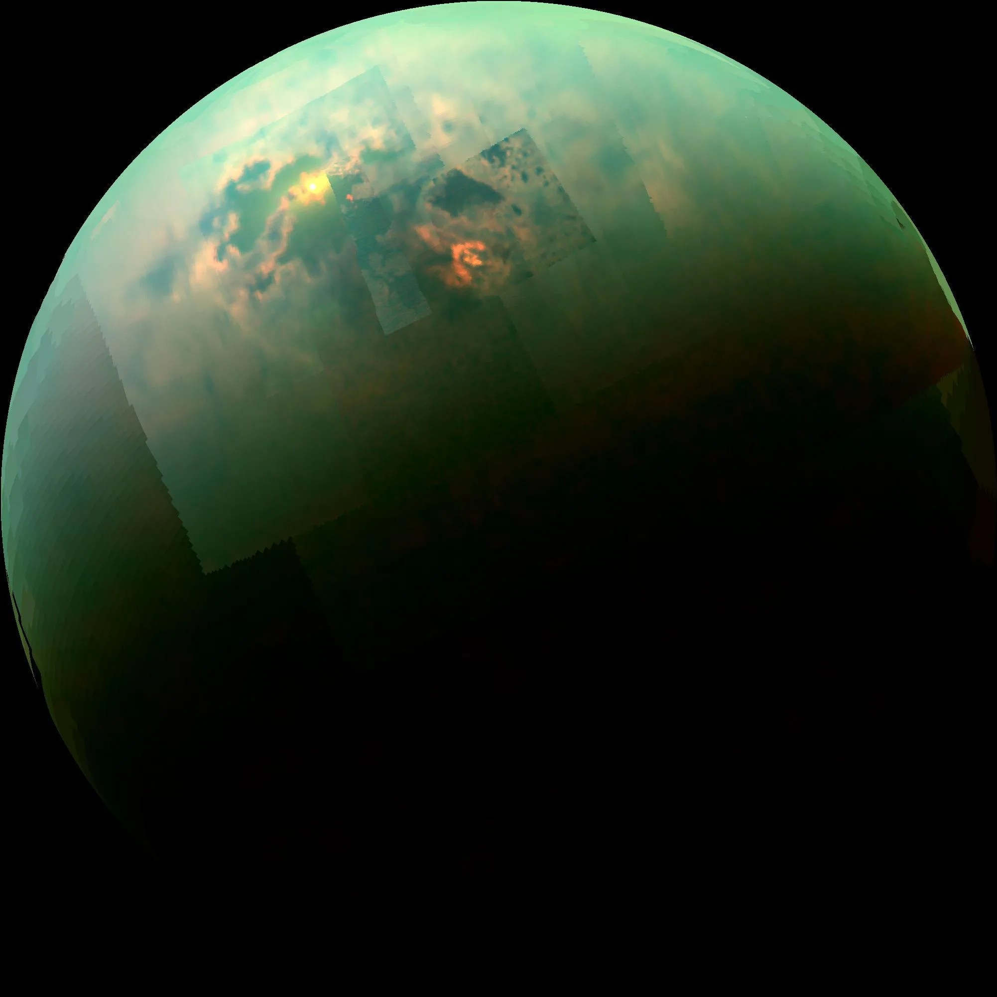Full view of Titan with sunlight glinting off lakes.