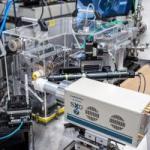 This image shows an upstream view of the 13 IDE microprobe setup showing the 7-element silicon drift detector/x-ray fluorescence detector, sample stages and mount, optical microscope, KB-Mirror focusing enclosure, and ion chamber and filter box.