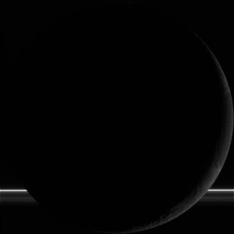 NASA's Cassini spacecraft successfully completed its Oct. 1 flyby of Saturn's moon Enceladus, capturing this raw, unprocessed image of the moon.