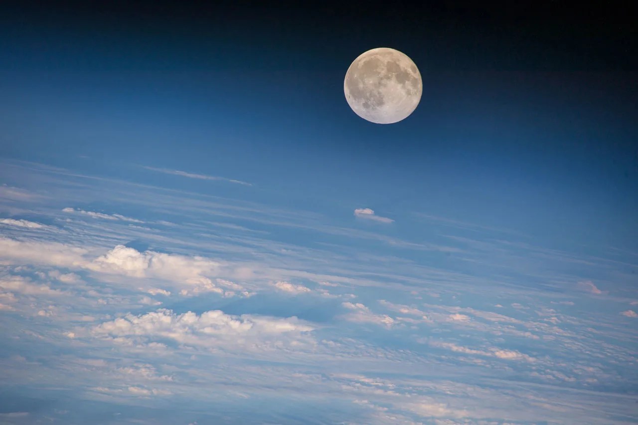 Full Moon rises over Earth as seen from International Space Station.
