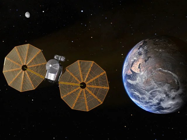 A spacecraft is shown approaching a globe of Earth, with a starry black sky in the background.