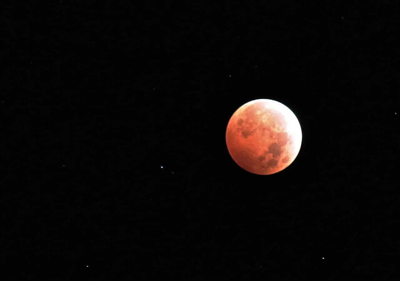 A lunar eclipse as seen from Utah on Oct. 8, 2014. Credit: NASA/Bill Dunford | More about this image