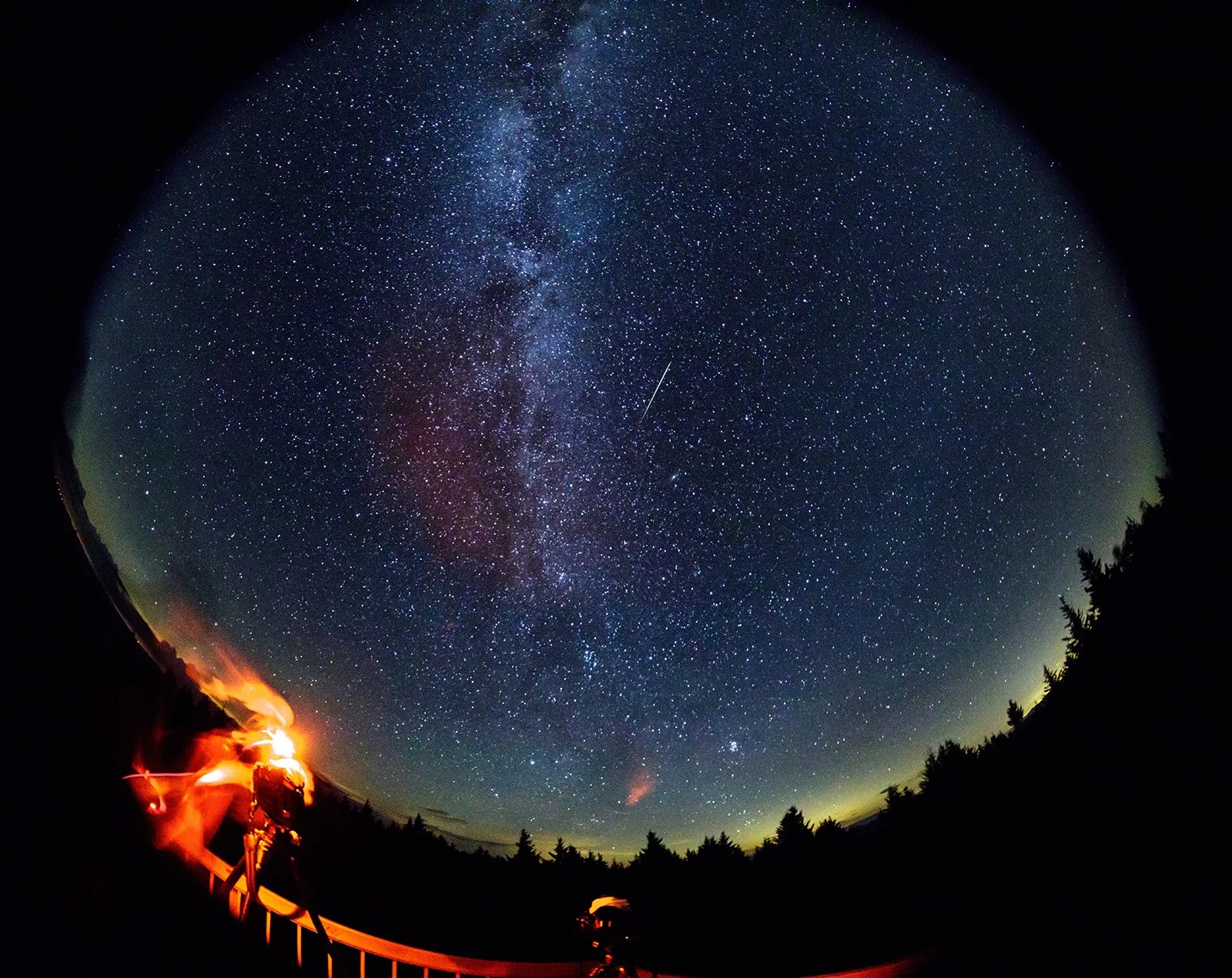 Meteor with Milky Way in the background.