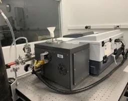 This image shows the Planetary Asteroid Regolith Spectroscopy Environmental Chamber (PARSEC) attached to a Thermo Nicolet 6700 FTIR spectrometer.