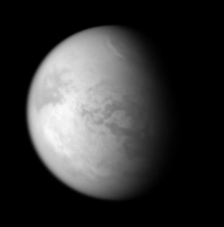 A bright streak of cloud graces the northern skies of Titan.