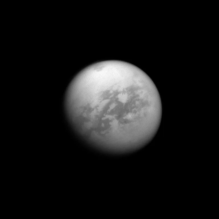 The Cassini spacecraft looks toward Saturn's largest moon, Titan, and spies the huge Kraken Mare in the moon's north. The image was taken Sept. 14, 2011.