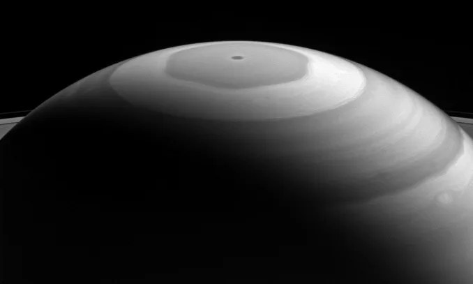 Saturn's north polar region displays its beautiful bands and swirls, which somewhat resemble the brushwork in a watercolor painting. › Full caption