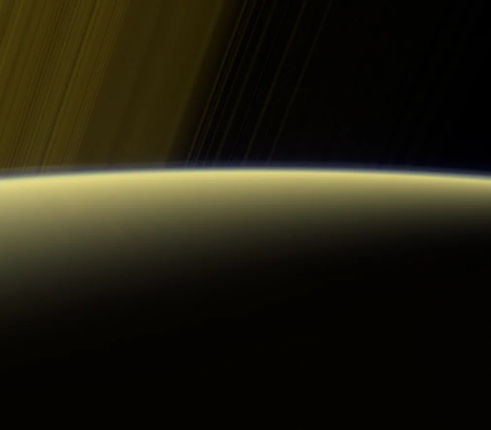 Color image of yellowish Saturn and its rings.