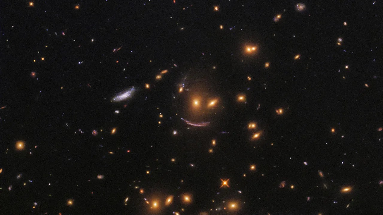 Three galaxies form a smiling fact.