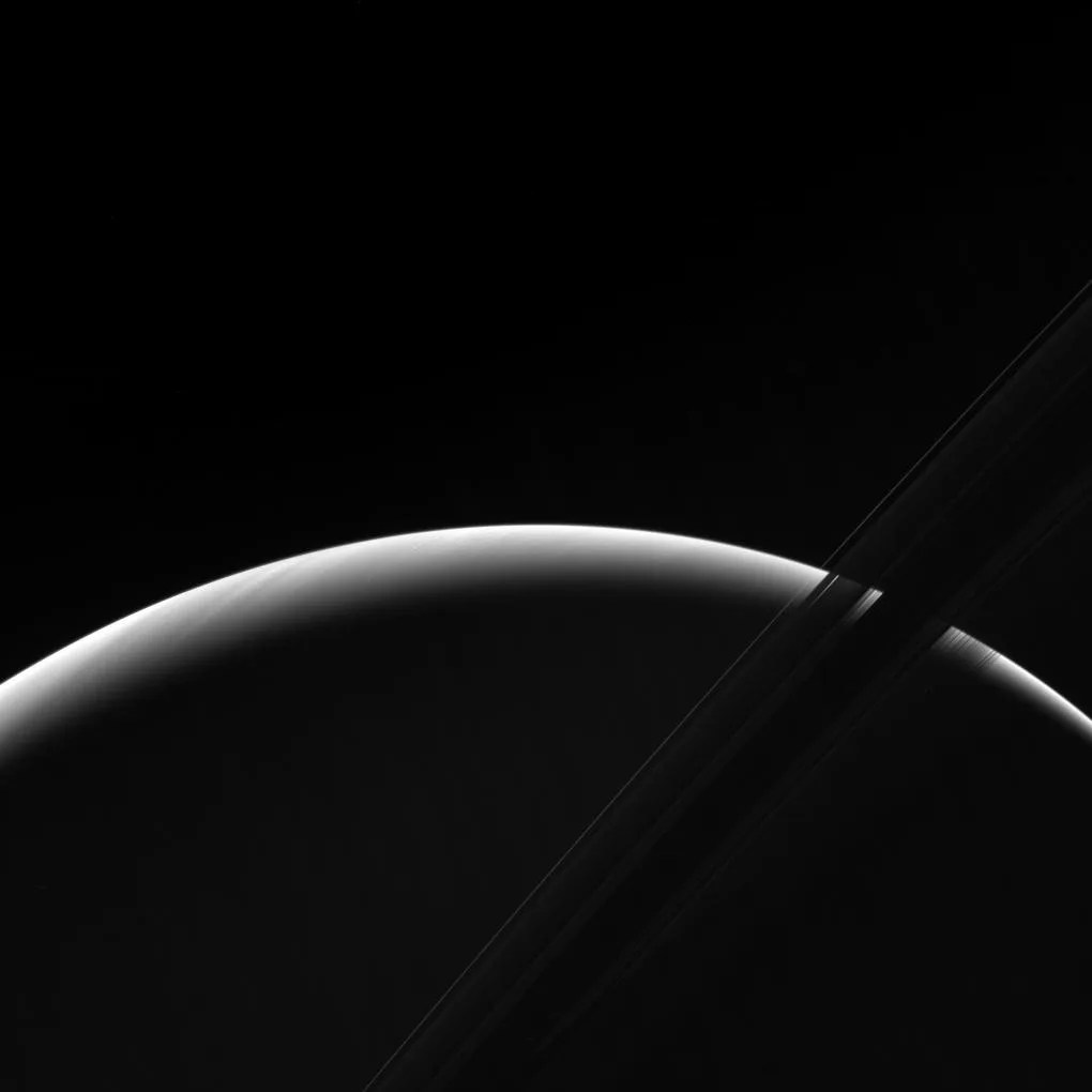 arc of Saturn against black background