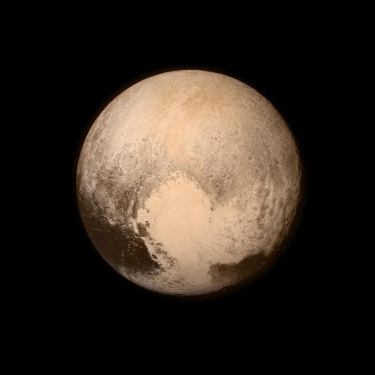 Reddish planet with a heart shape on it