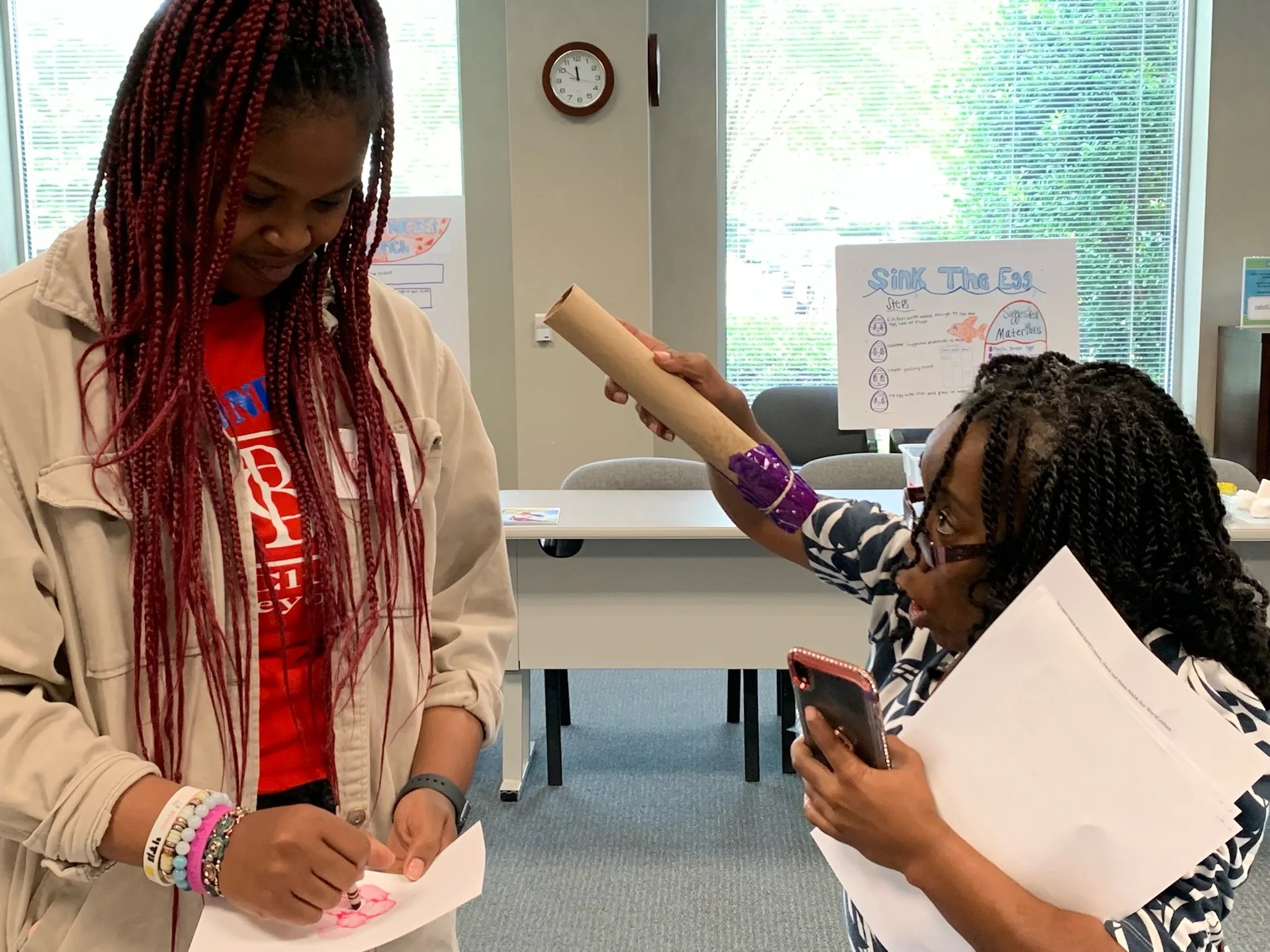 Photo of participants engaging with each other at the “Planning a STEM Event—New Strategies and NASA-Inspired Resources to Engage All Learners” training held at the National Institute of Aerospace.