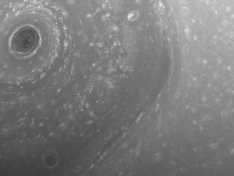 Part of the giant, hexagon-shaped jet stream around the Saturn's north pole.