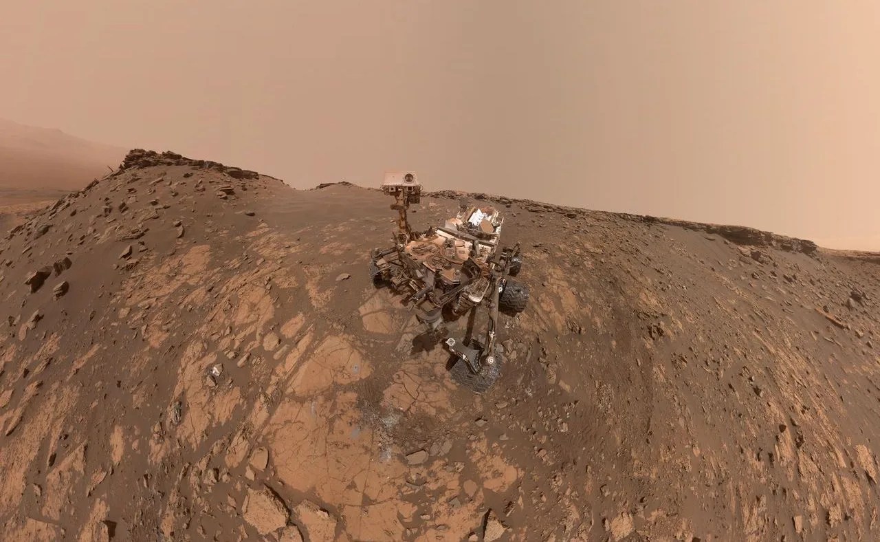mars rover in rocky landscape