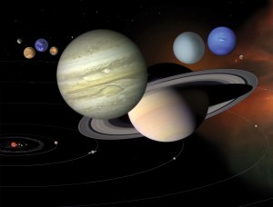An illustration of orange and blue planets and other objects in our solar system shown not to scale, but to illustrate some of the details of each world.