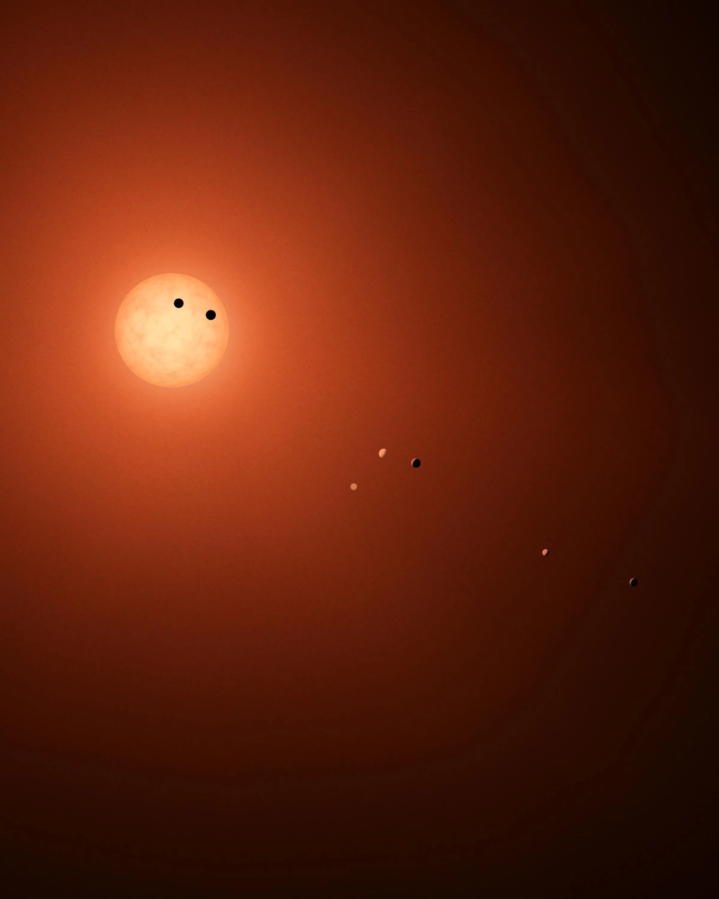 illustration shows the seven TRAPPIST-1 planets as they might look as viewed from Earth using a fictional, incredibly powerful telescope